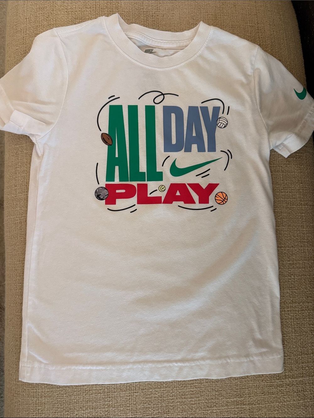 Nike White 'All Day Play' Graphic Tee with Multicolor Sports Print